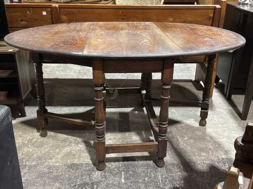 Antique Jacobean-style oak drop-leaf table