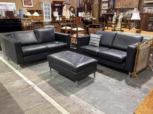 Three-piece black leather lounge suite