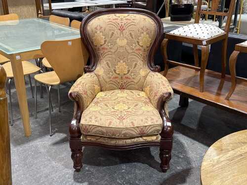 Antique upholstered armchair
