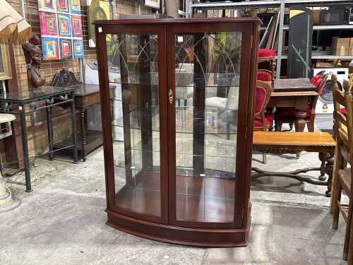 Bow-front glazed display cabinet, mahogany finish