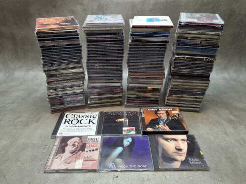 CDs, including Total guitar, Phill Collins