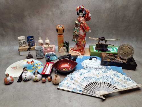 Japanese souvenirs including doll in national costume, ceramic vessels, Sumo wrestler scarf, etc