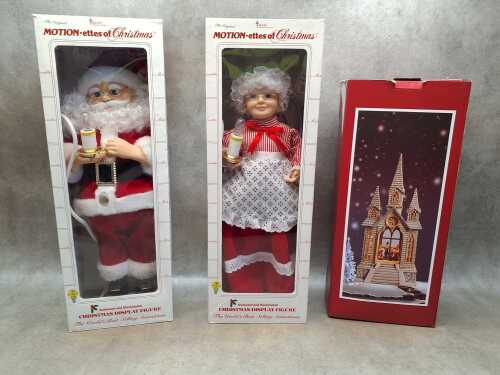 Three Christmas ornaments including dolls