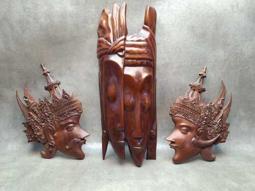 Three timber mask carvings, including Balinese