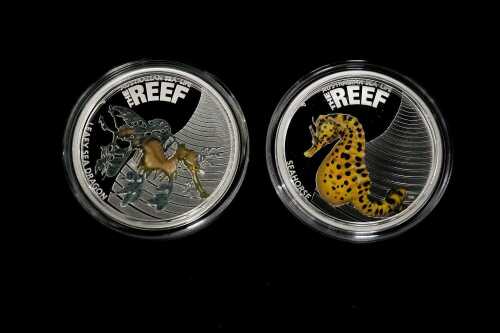 Two Australian Sea Life The Reef half ounce silver coins.