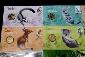Group of animal-themed collectable coins and PNCs - 2