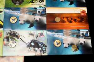 Group of animal-themed collectable coins and PNCs - 5