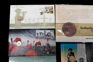 A group of Remembrance-themed collectable coins and PNCs - 2