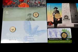 A group of Remembrance-themed collectable coins and PNCs - 3