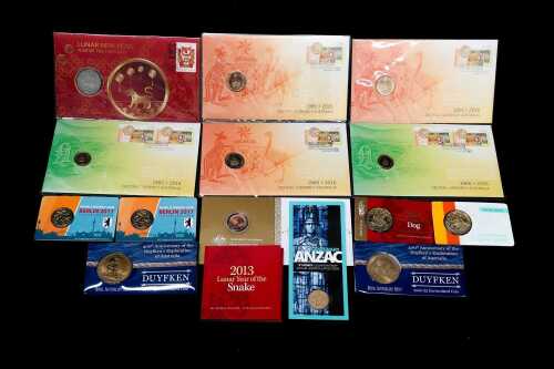 A group of collectable coins and PNCs