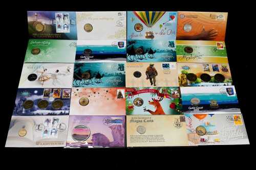 A group of assorted collectable coins and PNCs