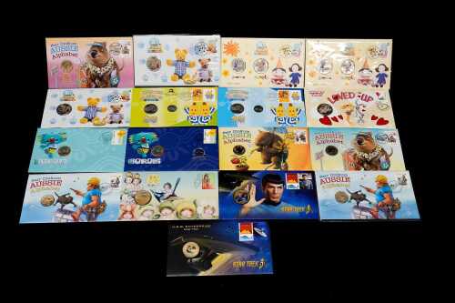 A group of collectable coins and PNCs