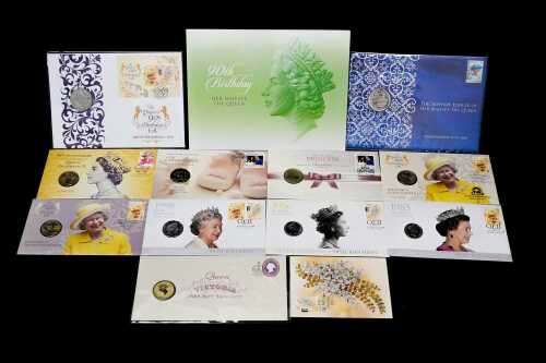 A group Queen Elizabeth II collectable coins and PNCs