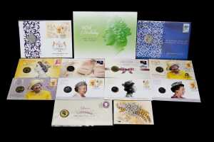 A group Queen Elizabeth II collectable coins and PNCs