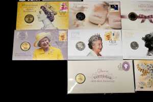 A group Queen Elizabeth II collectable coins and PNCs - 2
