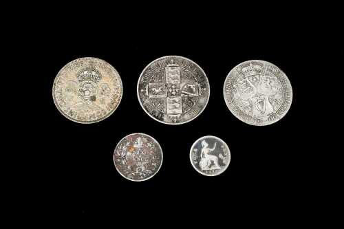 Five British pre decimal silver coins.
