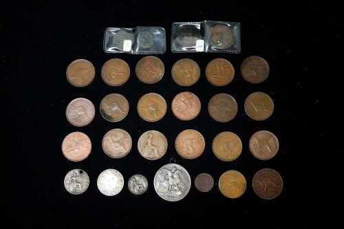 Group of ancient and modern coins.