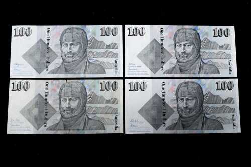Four Sir Douglas Mawson $100 paper banknotes