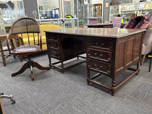 Jacobean Revival oak pedestal desk and swivel chair