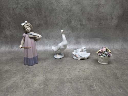 Three Nao by Lladro porcelain figures, plus a floral pot