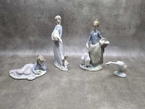 Four Lladro porcelain figures