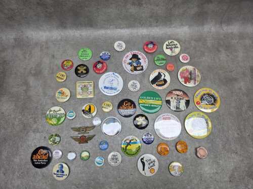 Retro badges and pins, including Abba