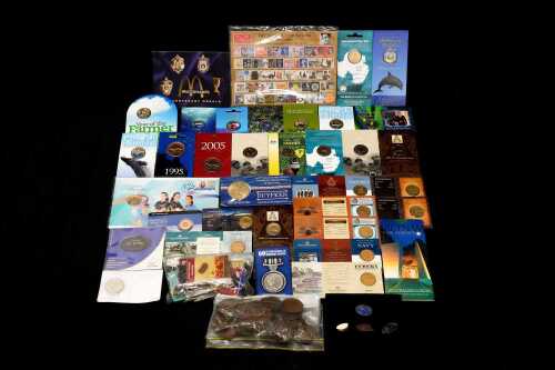 Box of assorted coins and pins