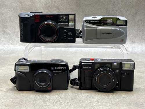 Four Olympus point & shoot 35mm film cameras