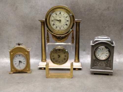 Four table and mantel clocks