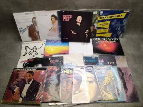 Vinyl records, including Nat King Cole, Charlie Sexton, Moody Blues