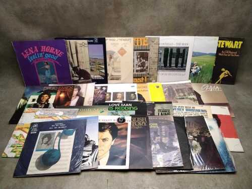 Vinyl records, including Pink Floyd, Bruce Springsteen, Otis Redding