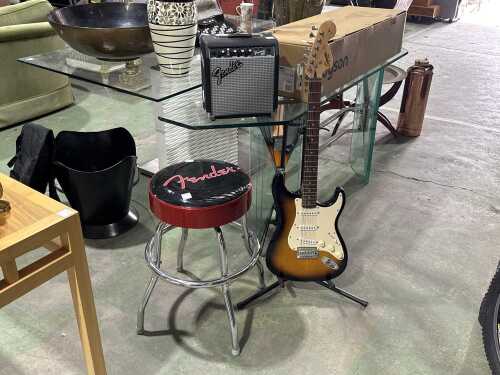 Fender electric guitar, amplifier and barstool