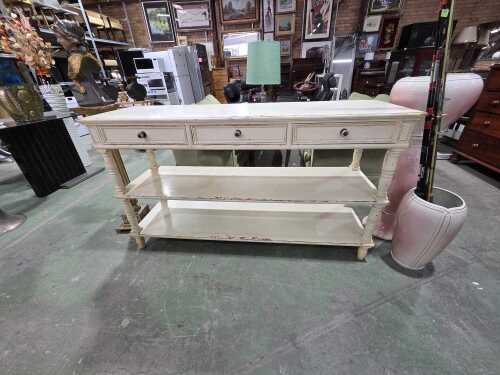 French provincial distressed cream three-drawer console with two shelves
