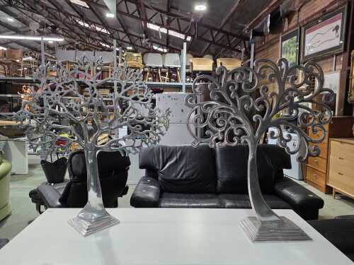 Two decorative aluminium tree silhouettes