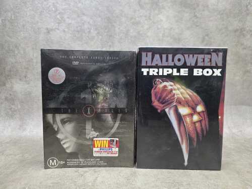 Two sealed DVD box sets