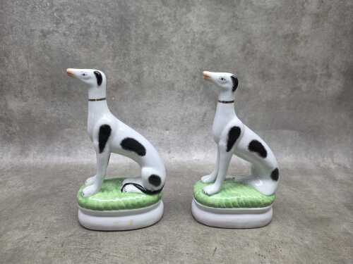 Pair of ceramic black and white greyhound figures