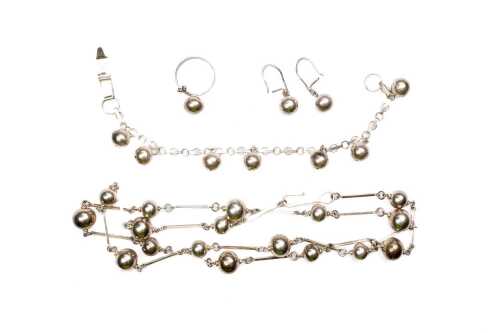A set of vintage jewellery in European silver