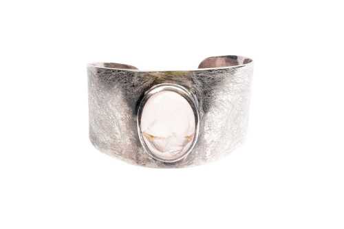 A rose quartz bangle in sterling silver