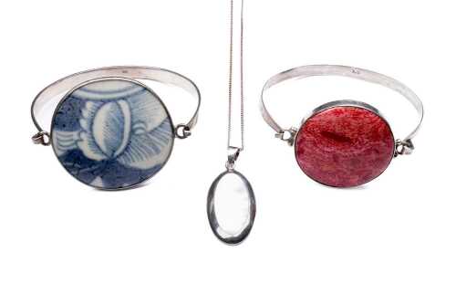 Two bangle and a pendant on chain in sterling silver