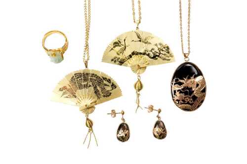 Collection of Jade, onyx and cubic zirconia jewellery in gold tone metal