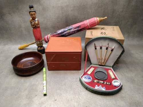 Mostly Japanese items including boxed calligraphy set, 2-tier lacquered box, traditional cane-ribbed umbrella, etc