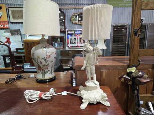 Cast metal cherub table lamp with pleated shade