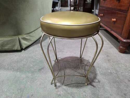 Mid-century gold vanity stool with cushioned seat