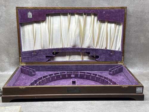 Vintage cutlery canteen containing assorted cutlery