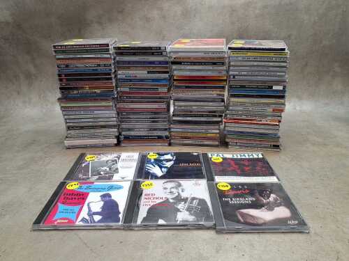 Jazz CDs, including Miles Davis, Charlie Sepulveda, J.J. Johnson