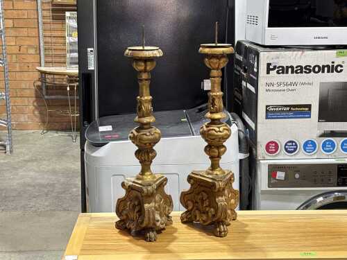 Pair of resin ornate gold tone candlesticks