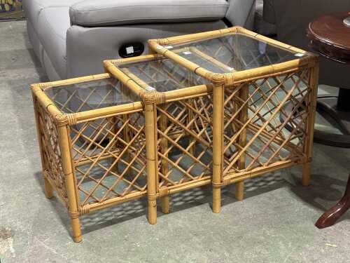 Nest of three cane side tables