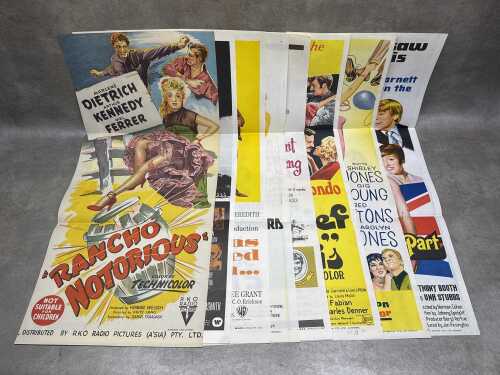 Eight vintage movie posters, including The Swarm and They Might Be Giants
