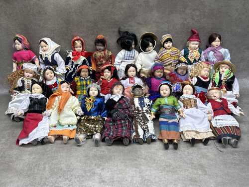 26 vintage 'Dolls of the World' porcelain dolls with traditional costumes