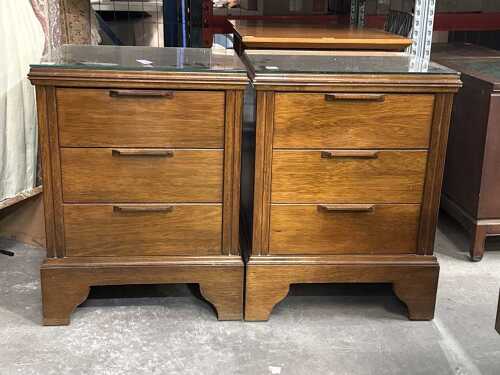 Pair of timber three-drawer bedside chests with glass tops